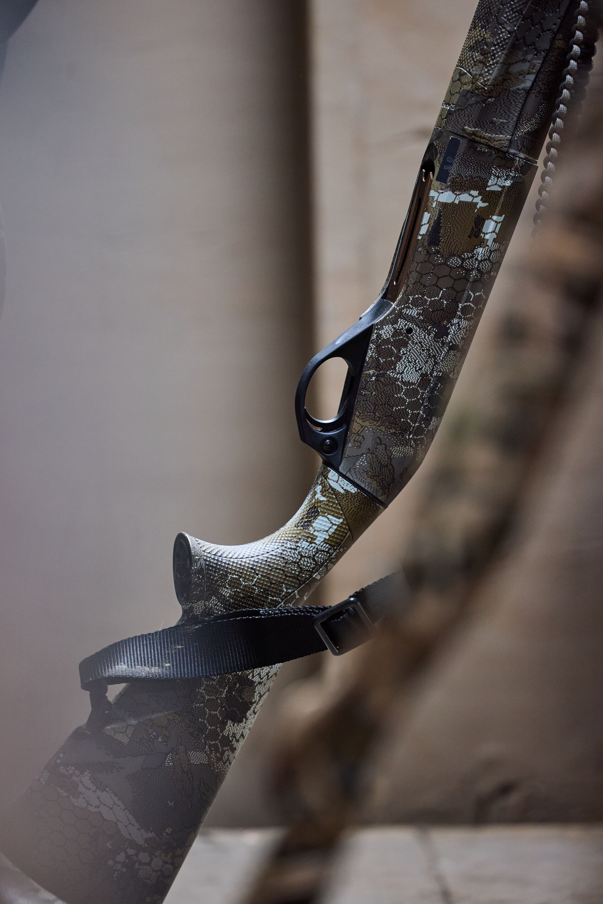 Shotgun leans against a wall, know how to clean a shotgun barrel concept.