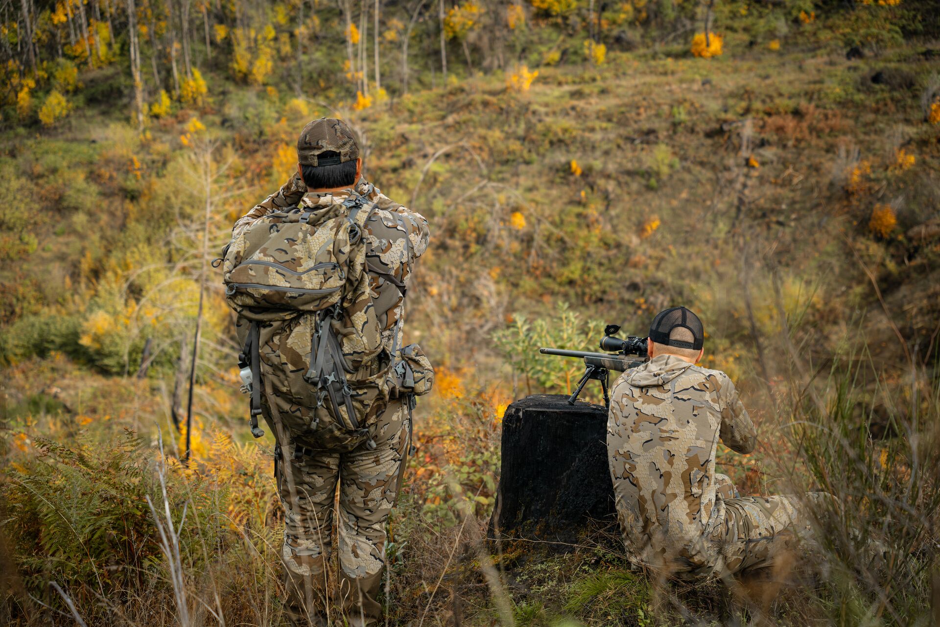 Two hunters on a long range rifle hunt. 
