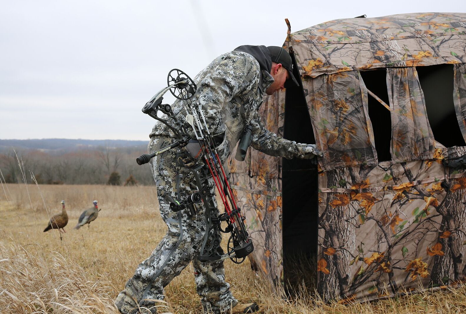 Hunter enters ground blind.
